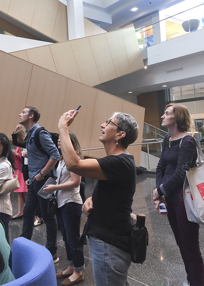 A member of the audience capturing Diffusion Choir in all of its glory.