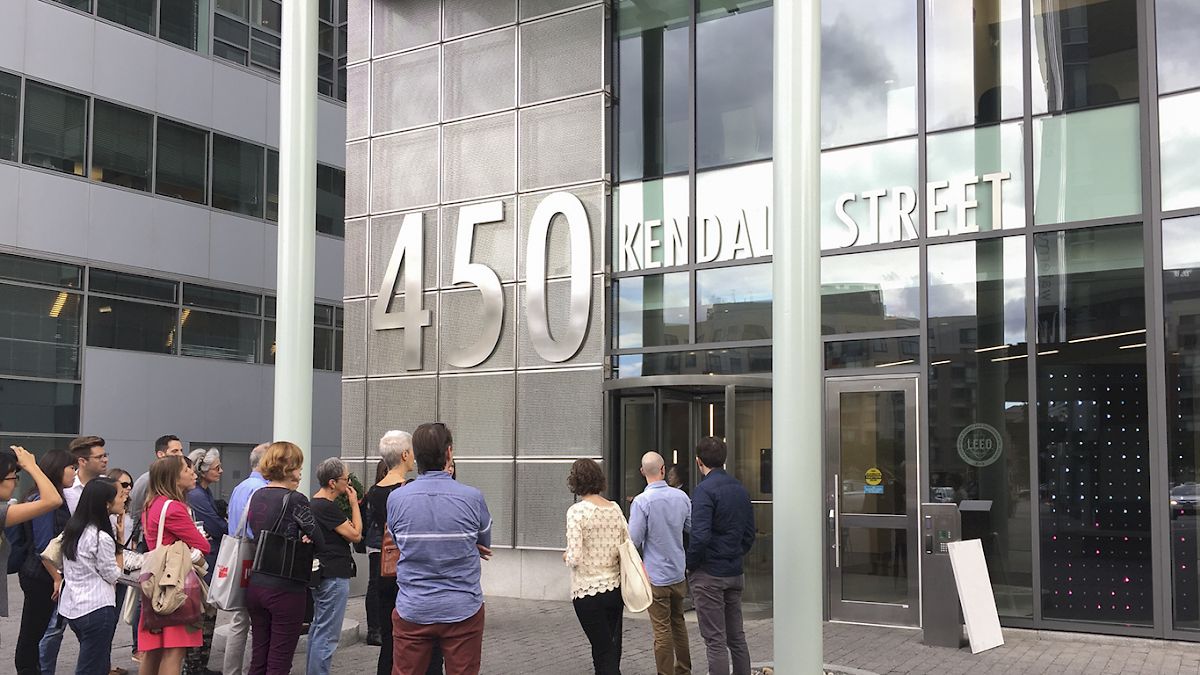 The audience gets a preview of the Innovation Clock outside of 450 Kendall St.